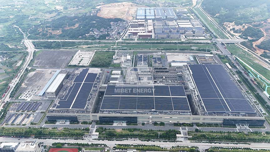 Wide aerial view: BOE factory complex with extensive Mibet Energy rooftop solar installations.