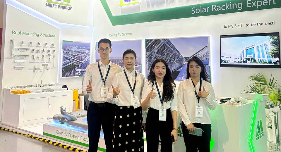 Group photo of MIBET staff at the Philippine exhibition