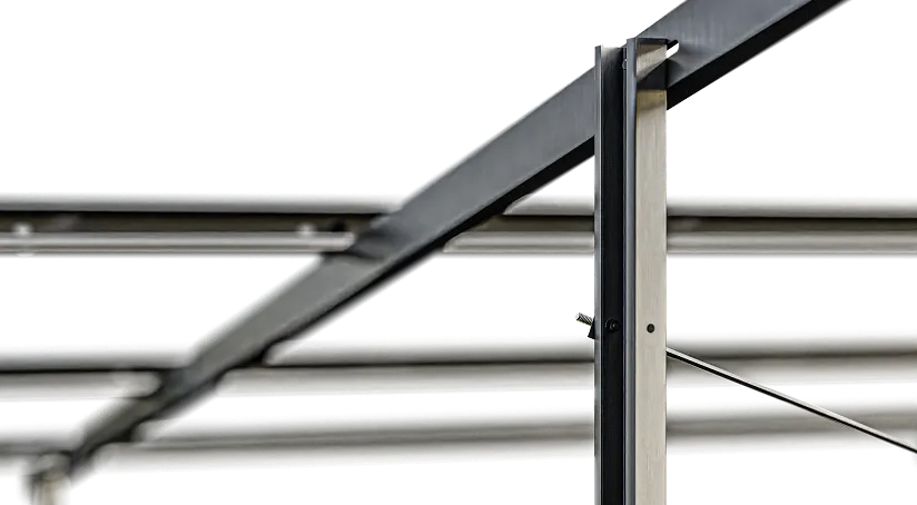 Multi-post solar ground mount structure using carbon steel and aluminum alloy.