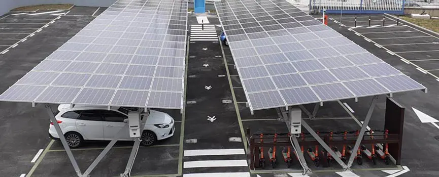 Ground-level solar carport structure