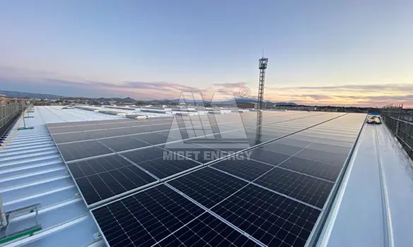 Japanese contractors install solar panels on the Public Works building roof  at Fleet Activities Sasebo, Japan